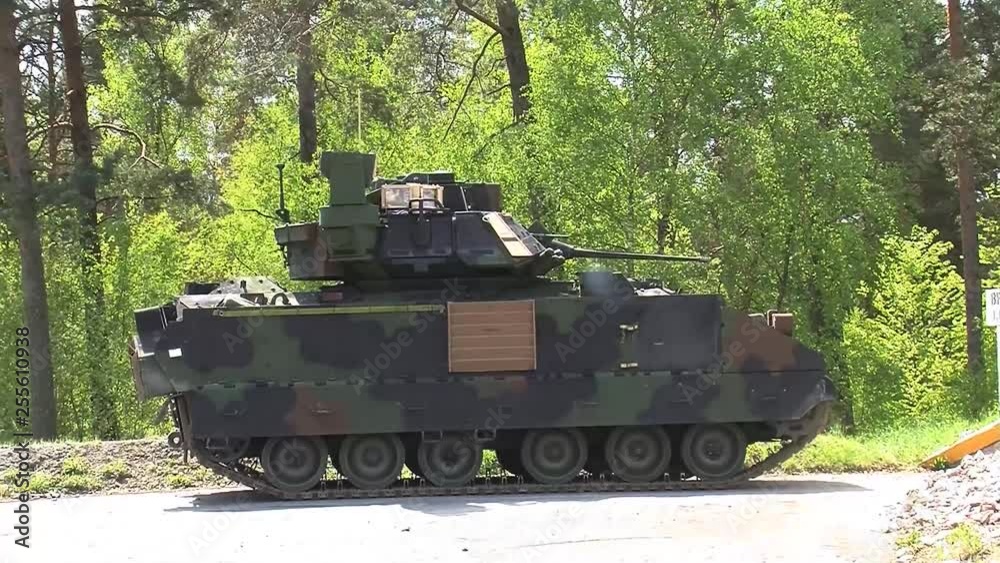 Soldiers testing the tank's machine gun. Soldiers testing the tank's machine gun.