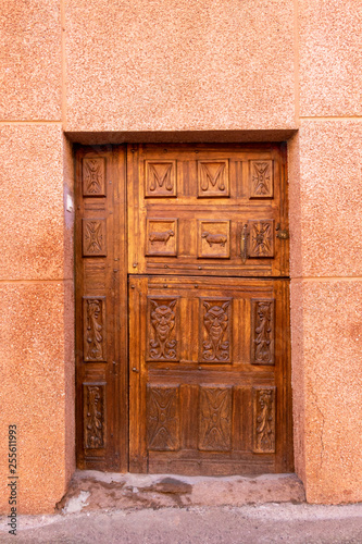 Beautiful wooden carved door in Azofra, La Rioja Spain photo