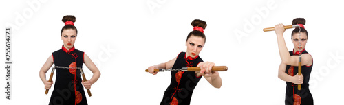 Funny woman with nunchucks isolated on white