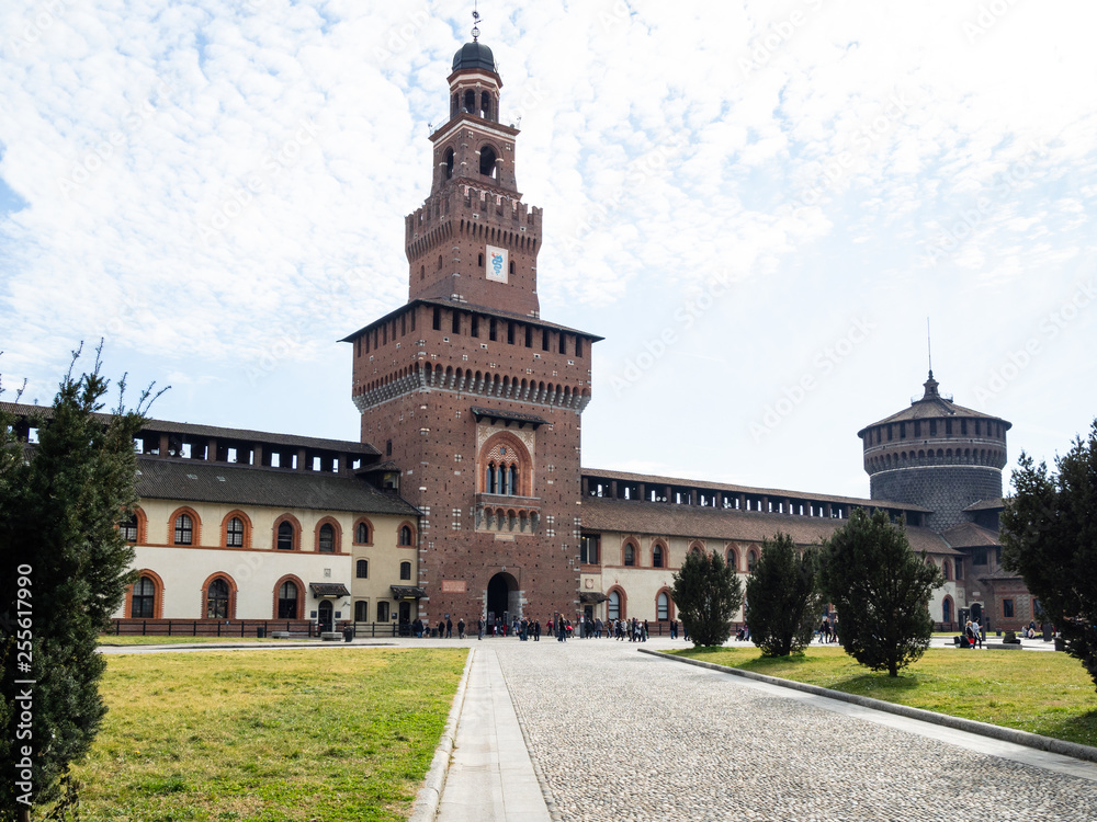 courtyard of Sforza Castle with towers in Milan