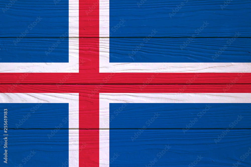 Fototapeta premium flag of Iceland on a wooden background