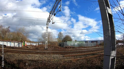 Footage of trains approaching Stoke on Trent train station in the midlands by the canal, waterside and A50 motorway photo