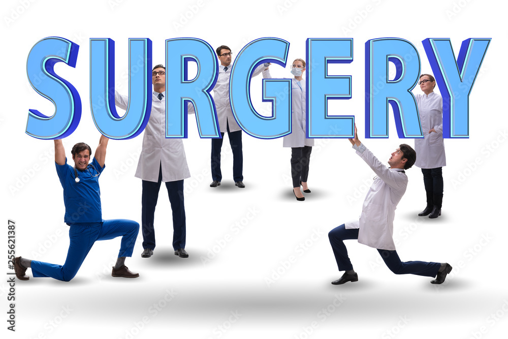 Group of doctors holding surgery letters Group of doctors holding surgery letters