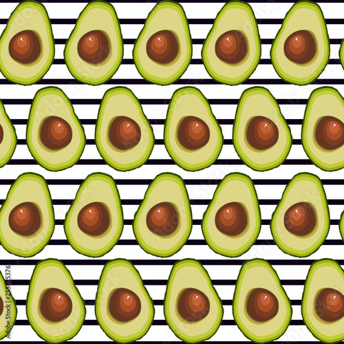 Seamless background of halved avocado fruit