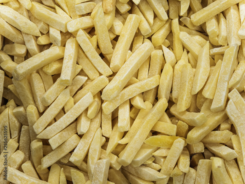 Frozen french fries in the refrigerator in the store Frozen french fries in the refrigerator in the store
