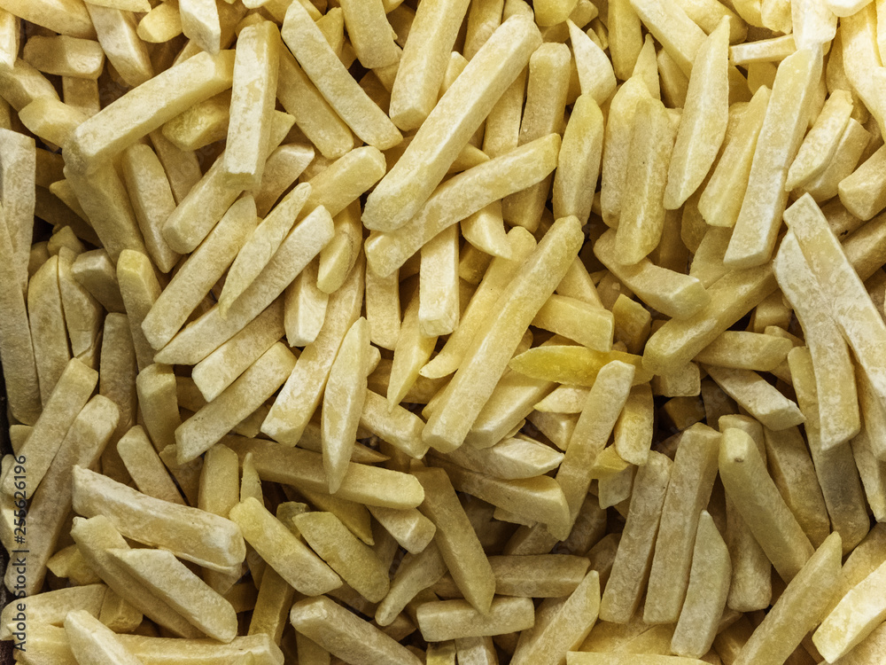 Frozen french fries in the refrigerator in the store Frozen french fries in the refrigerator in the store