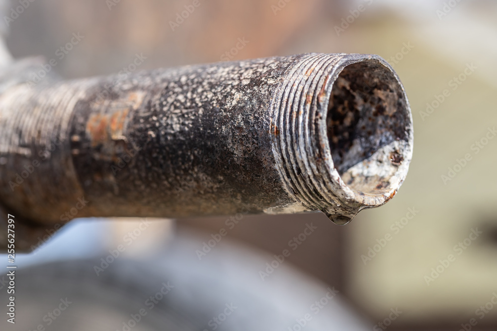 old rusty water tap from a barrel old rusty water tap from a barrel