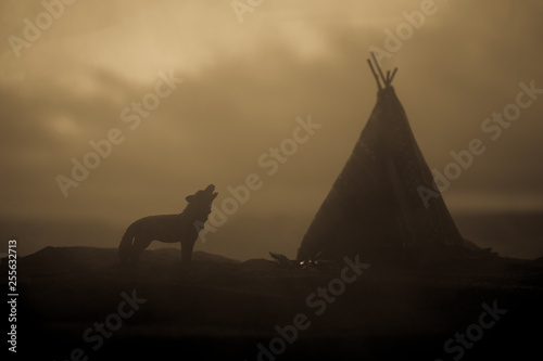 An old native american teepee in the desert photo