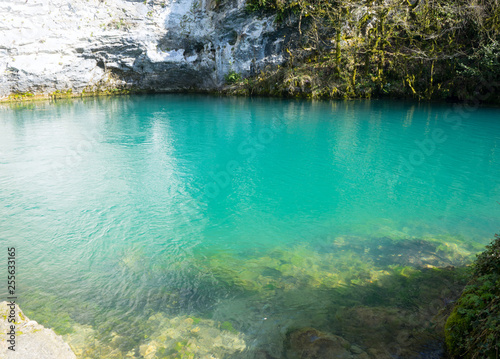 Fototapeta Naklejka Na Ścianę i Meble -  Beautiful and deep mountain lake with emerald water color