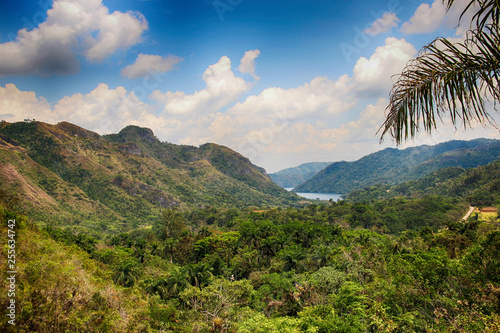The view of river and Waterfall El- Nicho and trees and mountains in Cuba photo