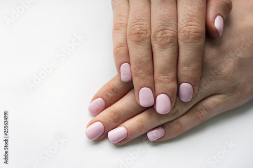 The manicured hand with pink nail free text for photo