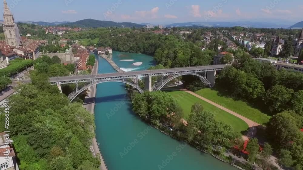 Wide establishing shot top down on the Kirchenfeldbrücke in Bern the Capital of Switzerland. The Aare River flows underneath the bridge on a sunny day in July 2016. AERIAL SHOT. DRONE VIEW. Wide establishing shot top down on the Kirchenfeldbrücke in Bern the Capital of Switzerland. The Aare River flows underneath the bridge on a sunny day in July 2016. AERIAL SHOT. DRONE VIEW.