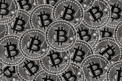 Many silver coins with Bitcoin sign, It is a cryptocurrency background. © Jana