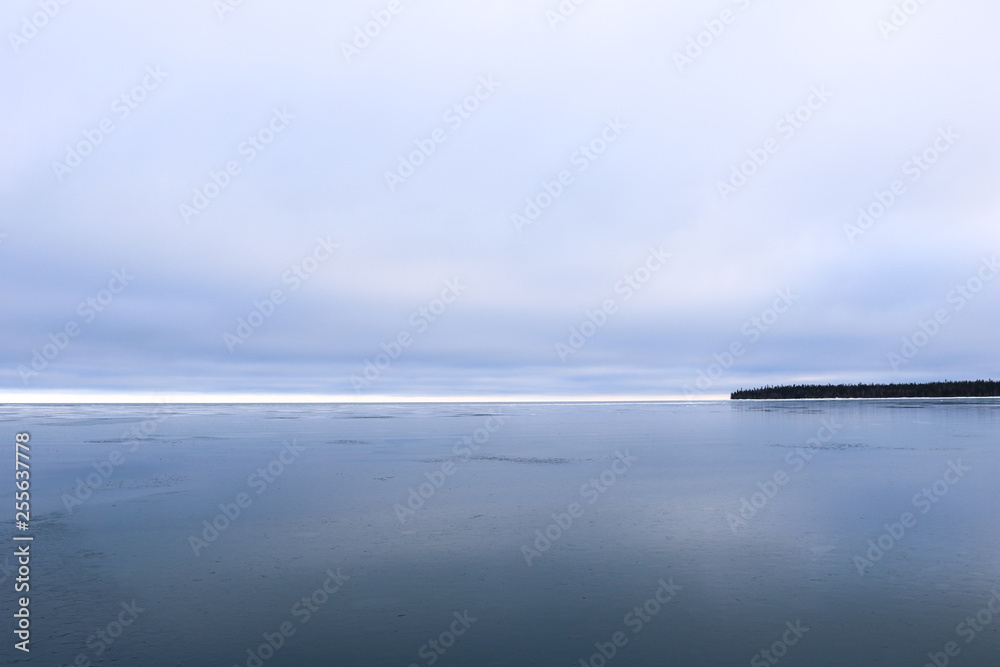 Island on Frozen Lake