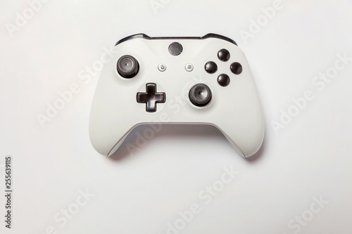 White joystick gamepad, game console isolated on white background. Computer gaming technology play competition videogame control confrontation concept. Cyberspace symbol
