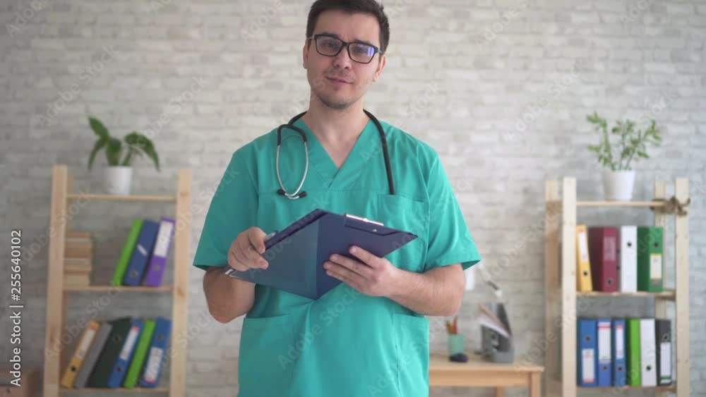 portrait of male doctor, middle-aged in uniform with stethoscope