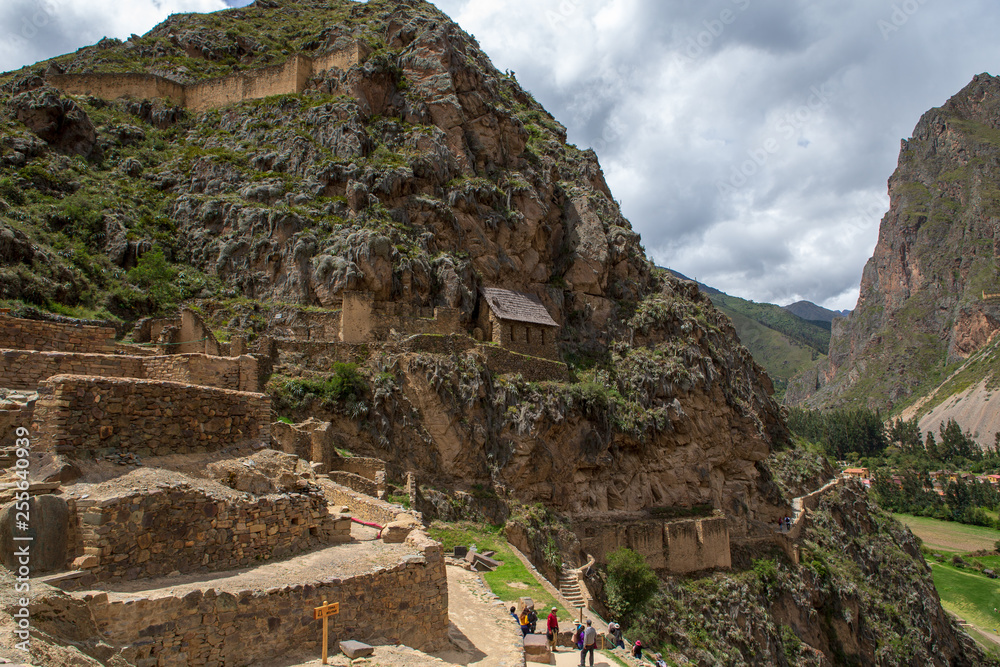 Ancient inka fortress in Ollantaytambo, Peru on cloudy day march 2019