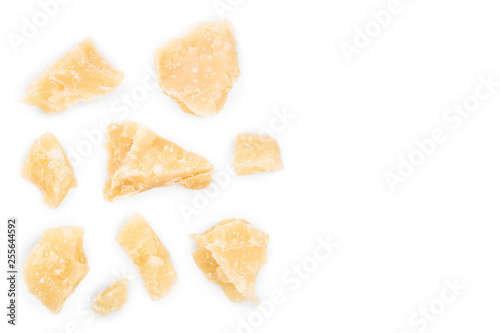 Parmesan cheese pieces isolated on white background with copy space for your text. Closeup. Top view. Flat lay