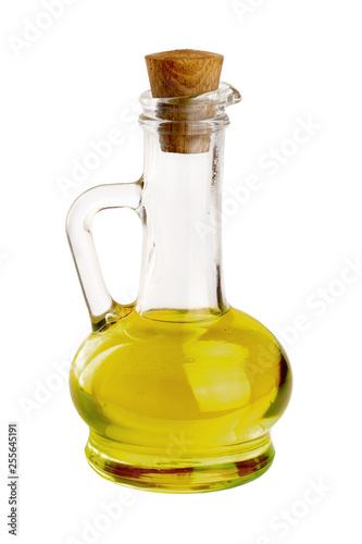 A glass bottle with olive oil isolated on a white background