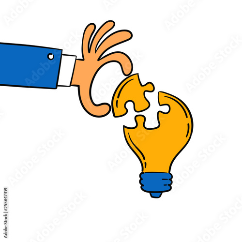 Hand put a part of light bulb puzzle, idea concept