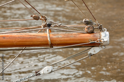 closeup of old wooden sail mast photo
