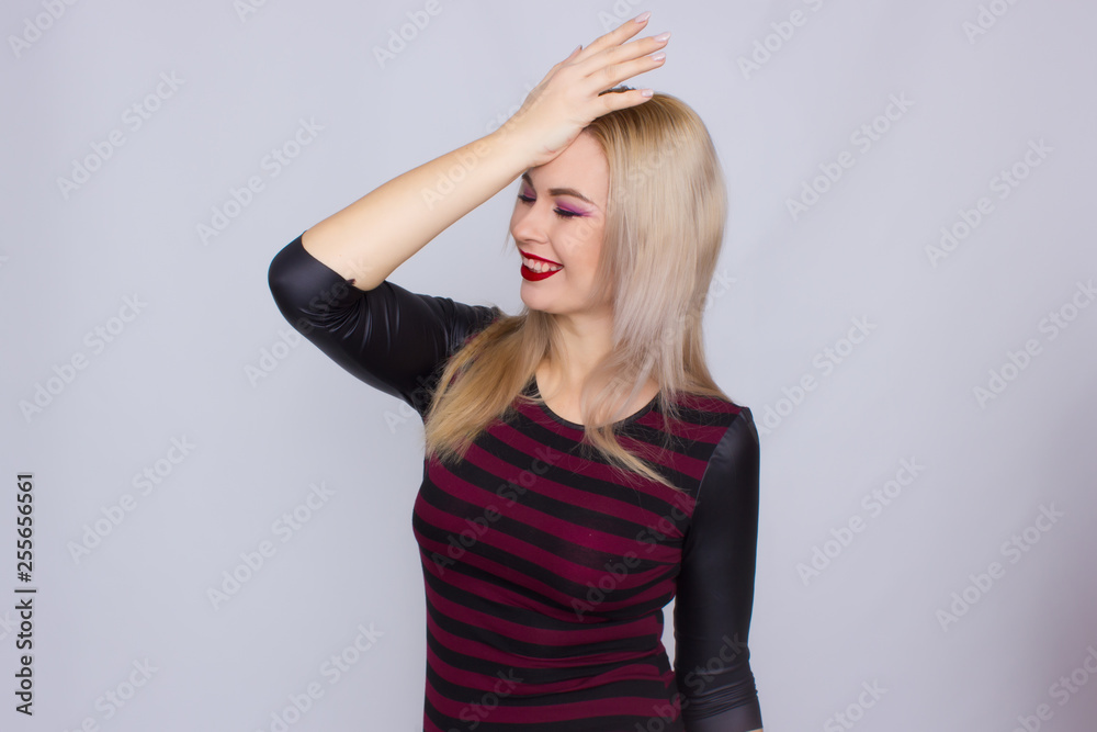 Blonde woman in red and black dress Blonde woman in red and black dress