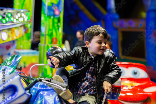  boy at the fair on a motorcycle