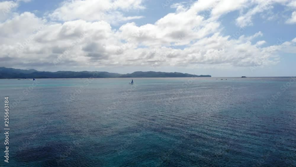Aerial - Sail Boat Beautiful Blue Ocean, Peaceful Sailing in Paradise. Aerial - Sail Boat Beautiful Blue Ocean, Peaceful Sailing in Paradise.