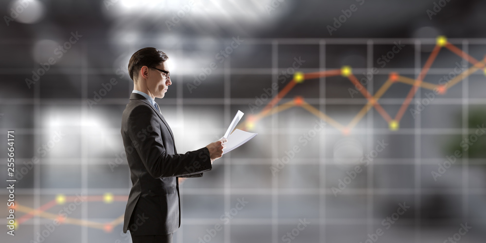 Preparing annual financial report. Mixed media Preparing annual financial report. Mixed media