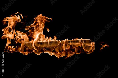 Fire and flame texture isolated on black background © Антон Фрунзе