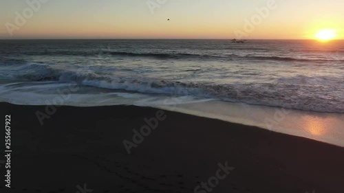 Wallpaper Mural Aerial footage of a lonely Northern California Coast.  Sunset Colors drench the footage in deep blues and oranges. No people you may see flying birds or sea life. Torontodigital.ca