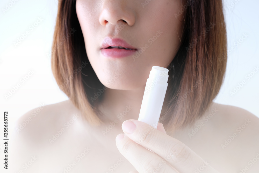 Young beautiful woman applying make up. Young beautiful woman applying make up.