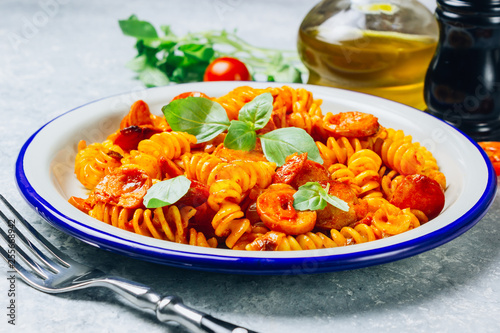 Pasta with sausage in tomato sauce, italian food