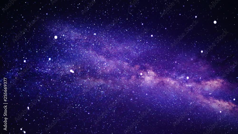Camera flying through a purple celestial nebula constellation and star field in deep outer space.