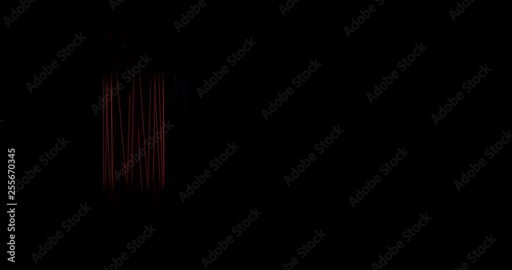 An antique tungsten bulb illuminates complete darkness. Concept background footage with copy space. An antique tungsten bulb illuminates complete darkness. Concept background footage with copy space.