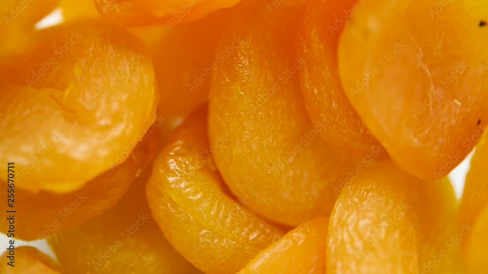 Super close up of Turkish apricot rotating. Flat plane. Top view Super close up of Turkish apricot rotating. Flat plane. Top view