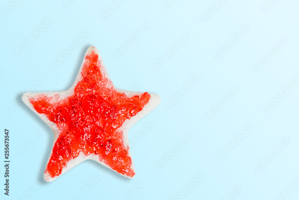 Bread cut into star shape, made with strawberry jam.