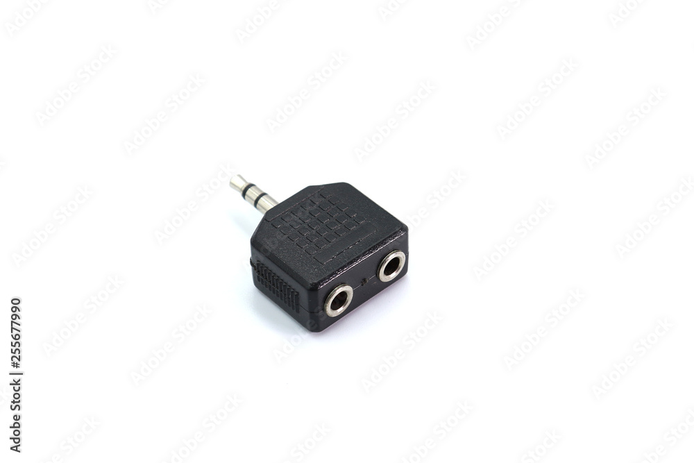 Stereo Plug To Dual RCA Jack Adapter isolated on white background. Stereo Plug To Dual RCA Jack Adapter isolated on white background.
