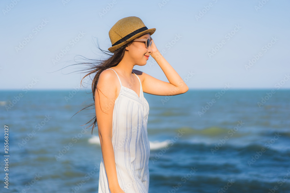 Portrait beautiful young asian woman happy smile relax around neary beach and sea Portrait beautiful young asian woman happy smile relax around neary beach and sea
