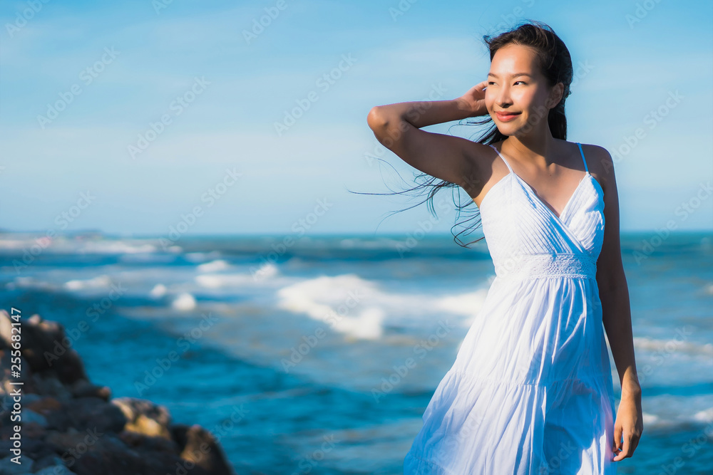 Portrait beautiful young asian woman happy smile relax around neary beach and sea Portrait beautiful young asian woman happy smile relax around neary beach and sea