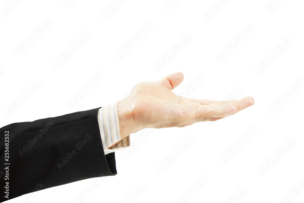 Man in a suit holds his hand with an open palm up isolated on white background