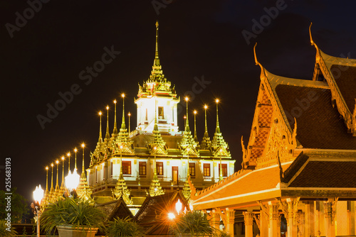 View of the Chedi Loha Prasat (The Metal Temple) in the night landscape. Bangkok, Thailand