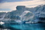 Icebergs. Blue ice, clear sea water.