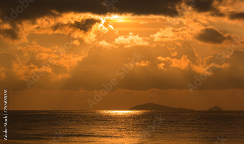 Beautiful sunrise on the beach. © niksriwattanakul