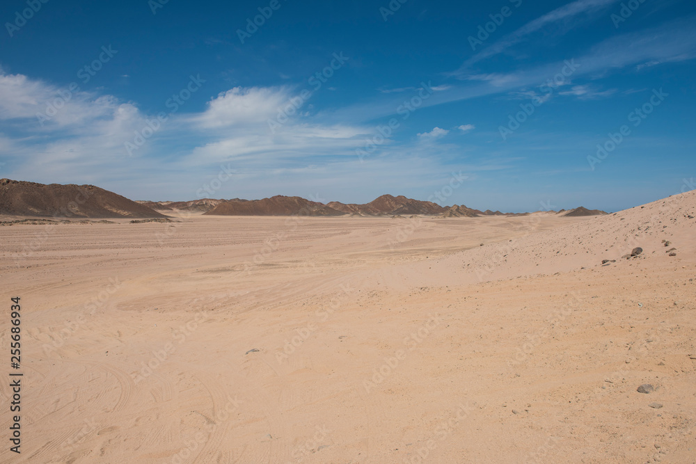Barren desert landscape in hot climate