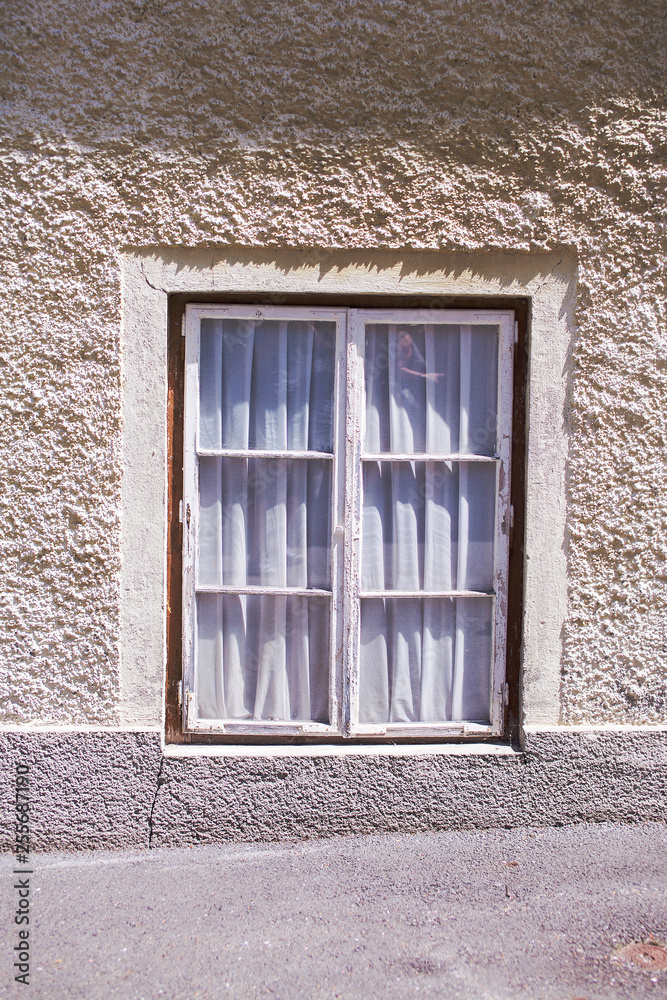 Fototapeta premium Old vintage wooden window in the Austrian city of Lofer