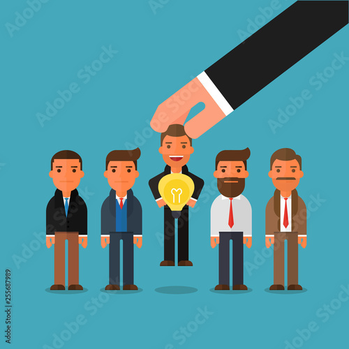 Hand choosing worker who has idea from group of businessmen. Recruitment concept.