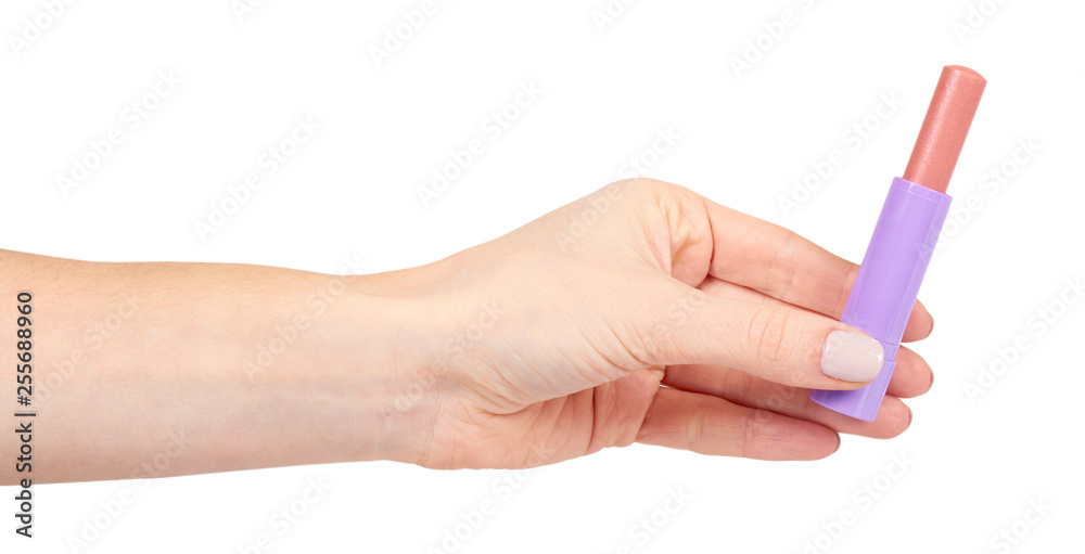 Hand with pink balm lipstick, lips care and beauty Hand with pink balm lipstick, lips care and beauty