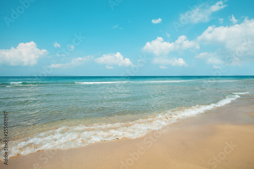 Sea and beach background. Skyline with sky clouds, sea and white sand