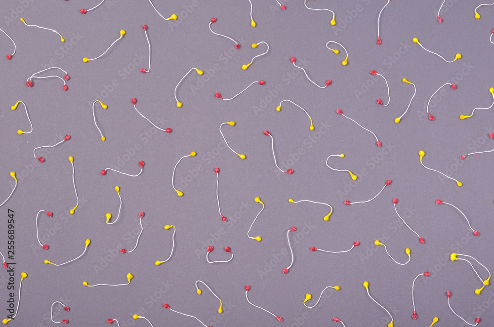 Decorative wooden beads composition, minimal background. Flat lay